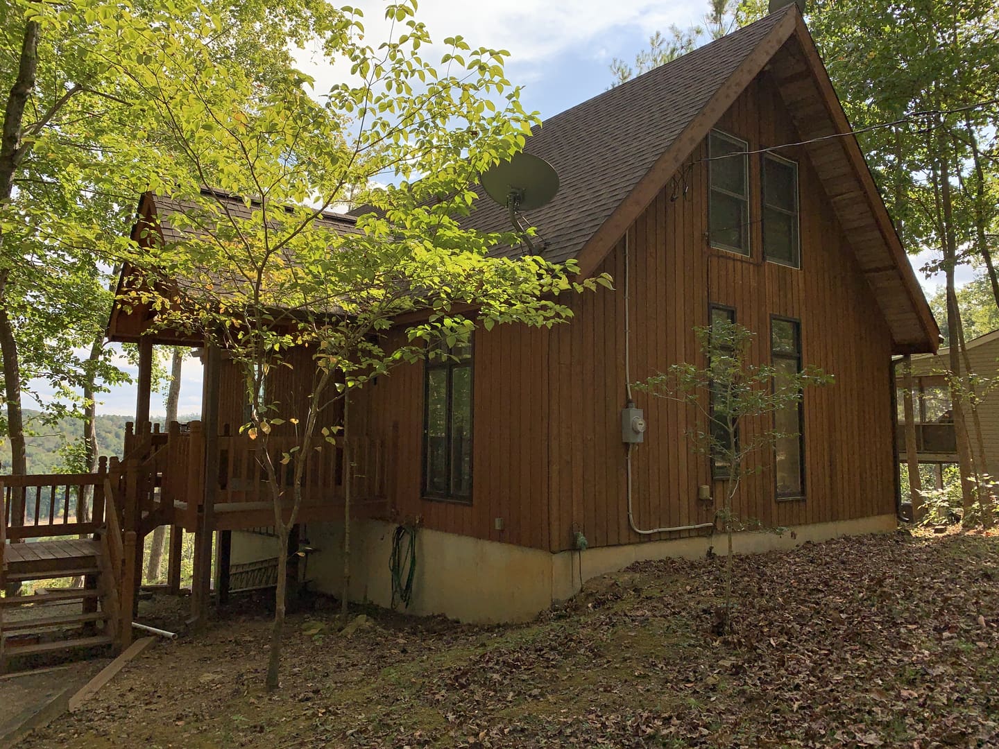 A cabin in a wooded area.